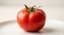 A vine tomato, the delivered line item the price alert refers to.