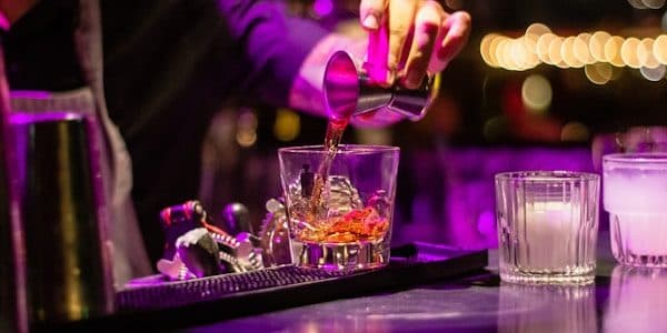 Bar with drinks and patrons