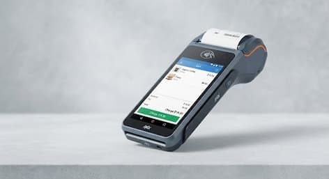 Android smart payment terminal with a built-in receipt printer, showing an open order on screen